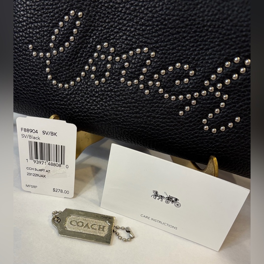 NWT COACH LIMITED EDITION STUDDED SCRIPT ZIPPER WALLET
7.5" (L) × 4" (H) - Picture 3 of 13